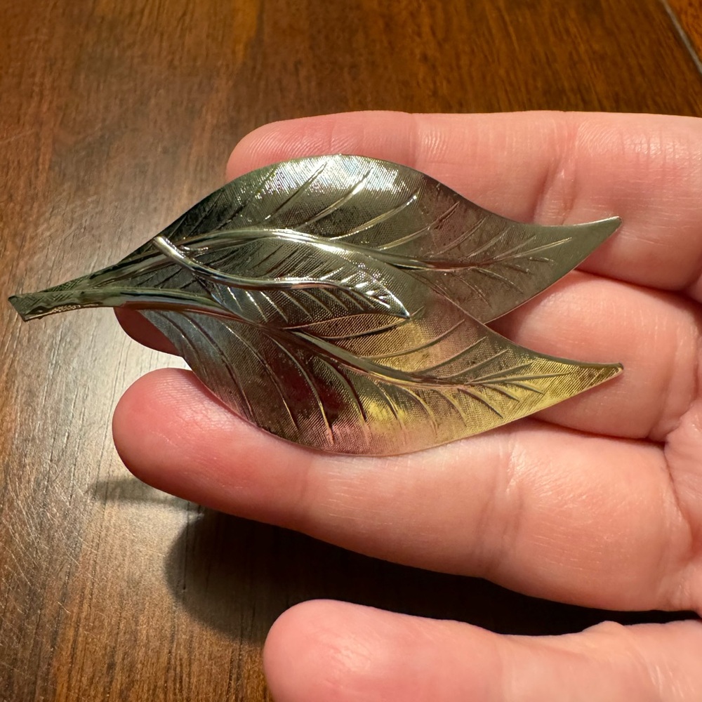 Vintage brushed silver tone leaves brooch, EUC. 3 1/4” l x 1 1/2” h.